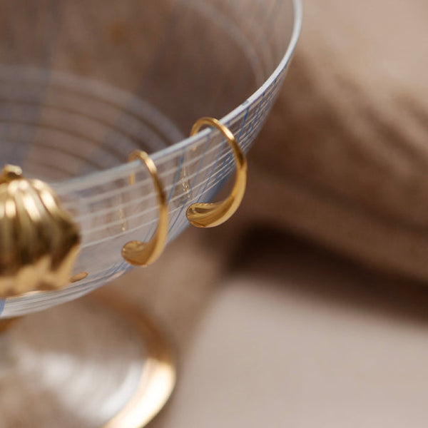 Dangling gold earrings