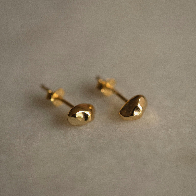 Swing baby gold studs.